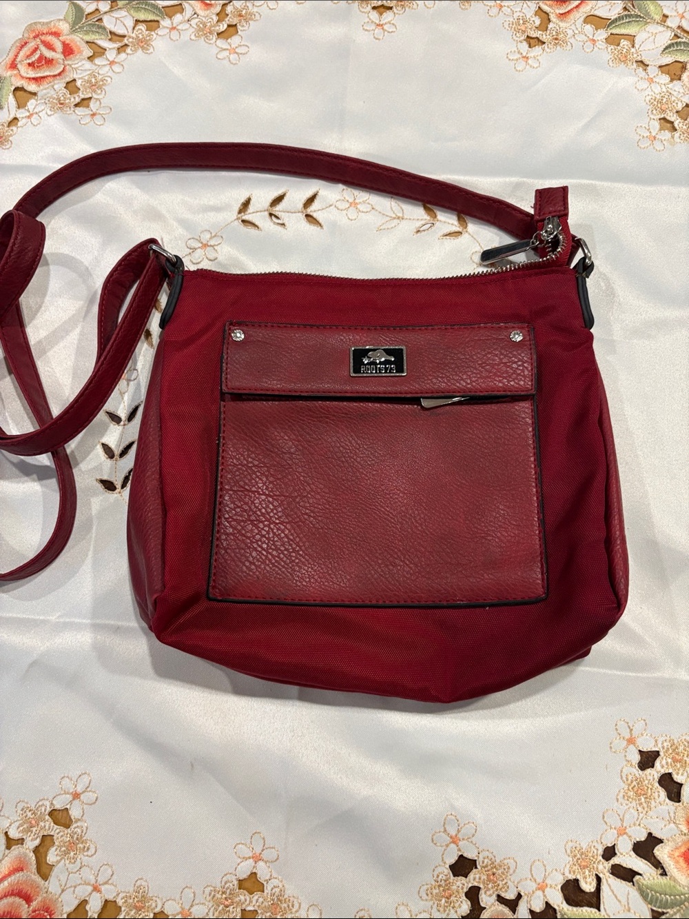 Roots Burgundy Red Crossbody Bag with Front Pocket